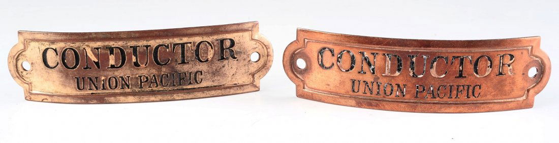 TWO UNION PACIFIC RAILROAD CONDUCTOR CAP BADGES (1 of 9)