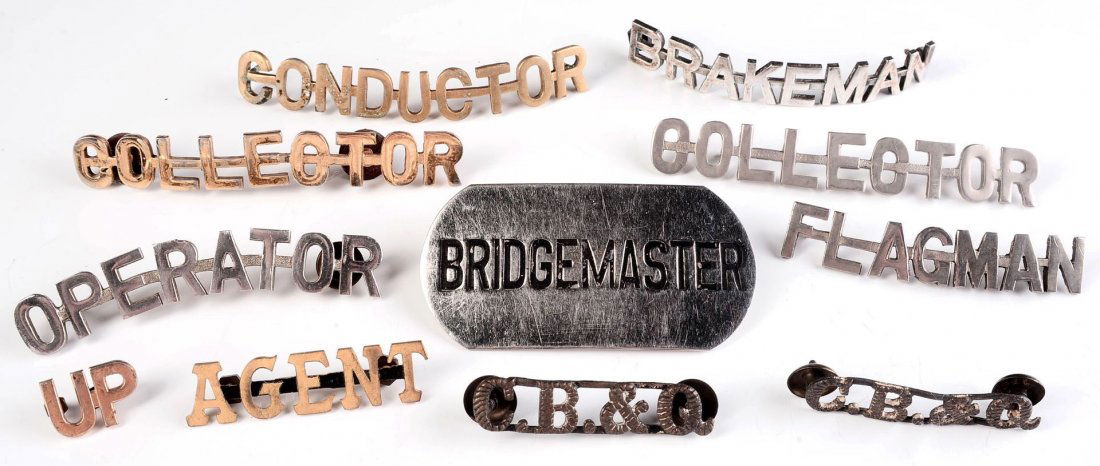 ELEVEN ASSORTED RAILROAD CAP BADGES (1 of 6)