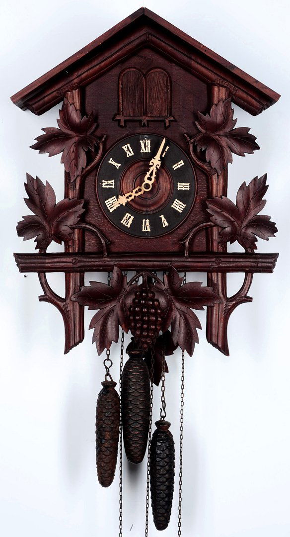 A BLACK FOREST 2DOOR CUCKOO CLOCK WITH BIRD AND MAN