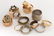 A GROUP OF 14K GOLD RINGS, BANDS AND MOUNTINGS