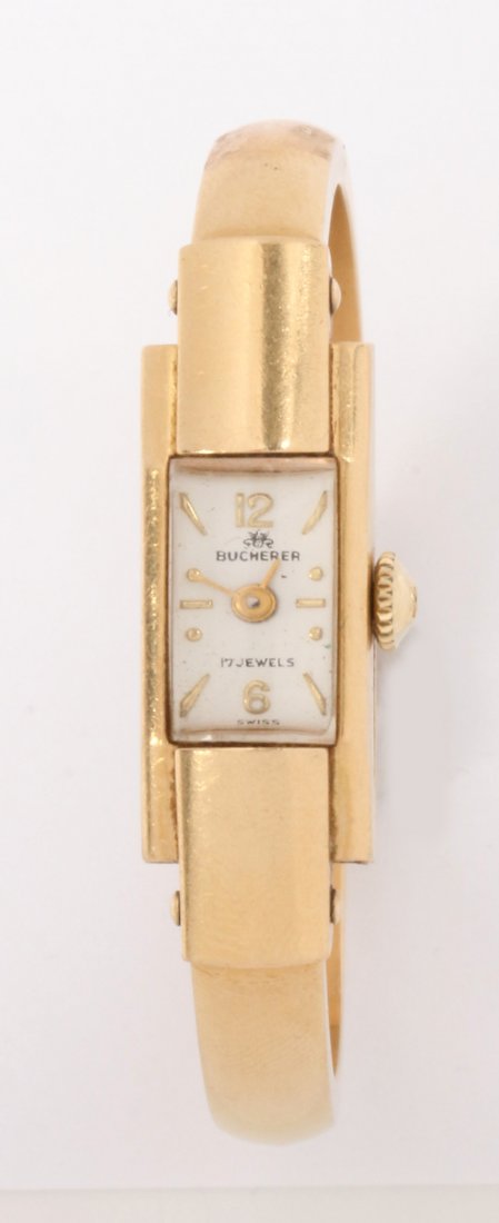 AN 18K GOLD BUCHERER 17 JEWEL WATCH AND BAND: With an adjustable band, total weight of 13 grams without the movement.