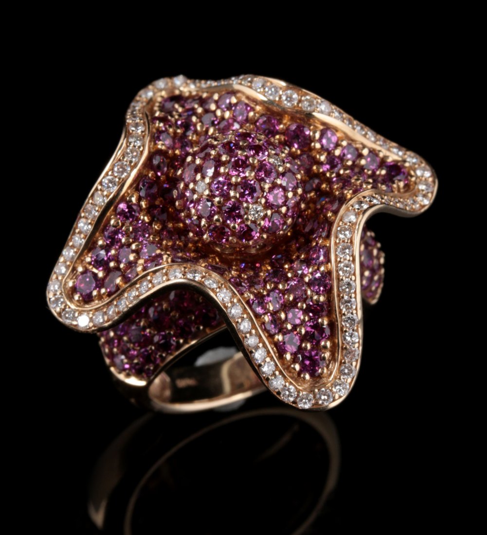 AN AMETHYST AND DIAMOND FLOWER-FORM FASHION RING (1 of 10)