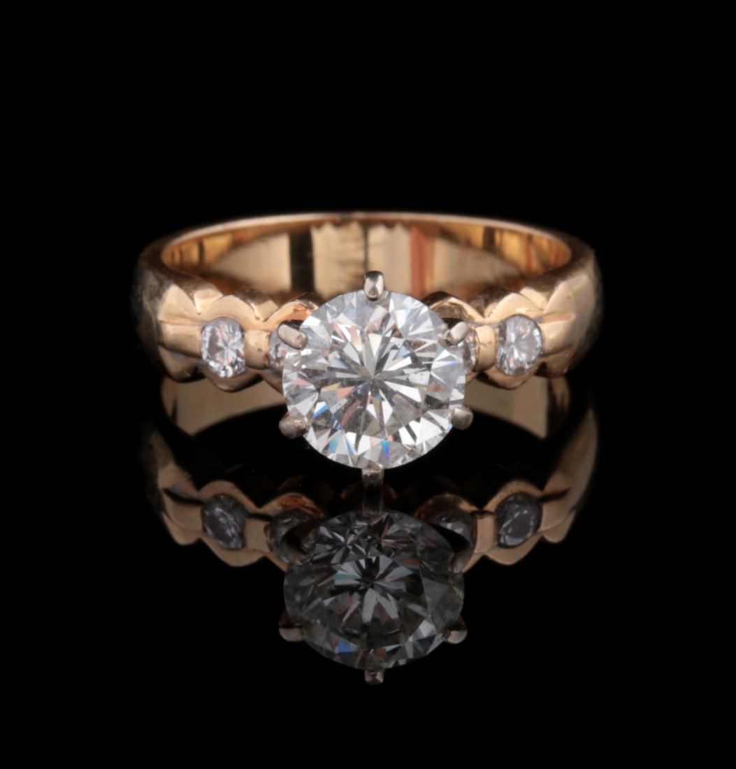 A ONE CARAT DIAMOND SOLITAIRE ENGAGEMENT RING (1 of 6)