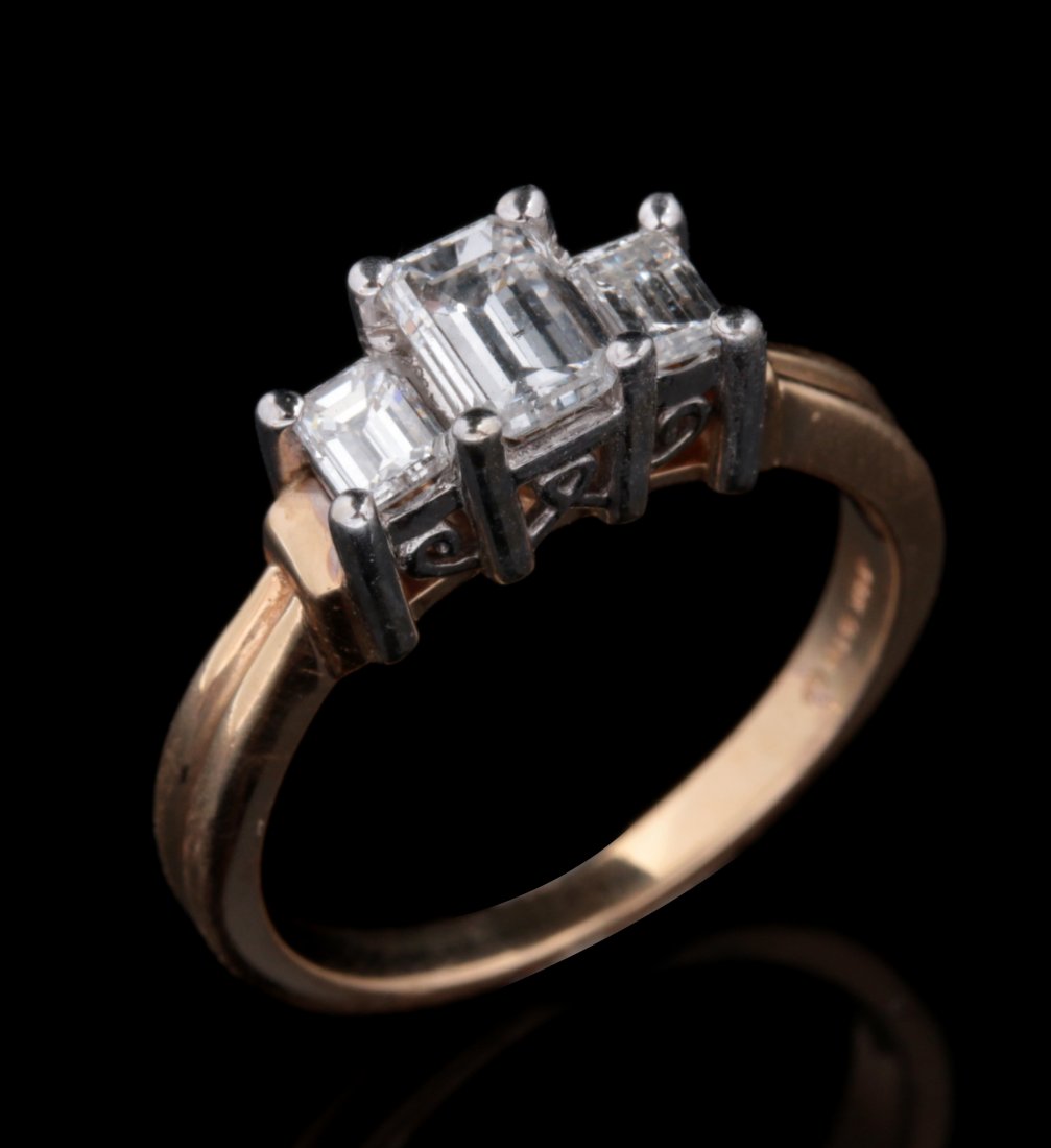 A 14K ENGAGEMENT RING WITH THREE EMERALD CUT DIAMONDS (1 of 8)