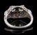 A 1930S PLATINUM DIAMOND AND SAPPHIRE SCROLL RING - 7