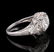 A 1930S PLATINUM DIAMOND AND SAPPHIRE SCROLL RING - 8