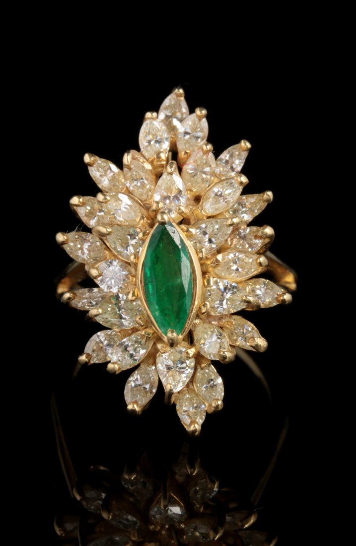 AN 18K MARQUIS CUT EMERALD AND DIAMOND COCKTAIL RING (1 of 8)