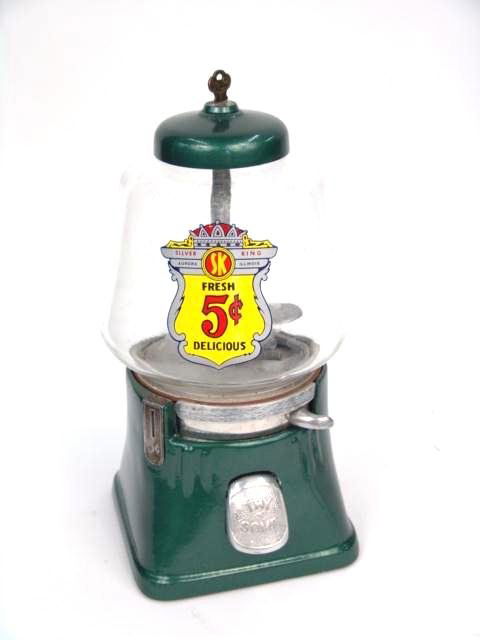 RESTORED ANTIQUE 5 CENT GUM BALL MACHINE: Complete with key, mechanism needs work. Measures 13.5 inches high.