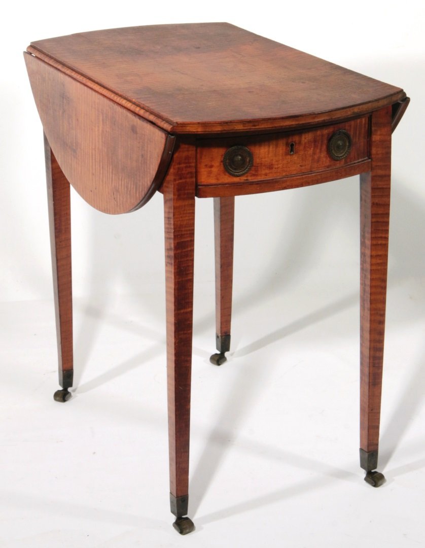 PERIOD AMERICAN TIGER MAPLE HEPPLEWHITE PEMBROKE TABLE: An 18th c. New England Pembroke table with highly figured tiger maple top and half-round drop leaves, swing-out support brackets, a bowed front drawer with cock beading at one end; a false drawer fron