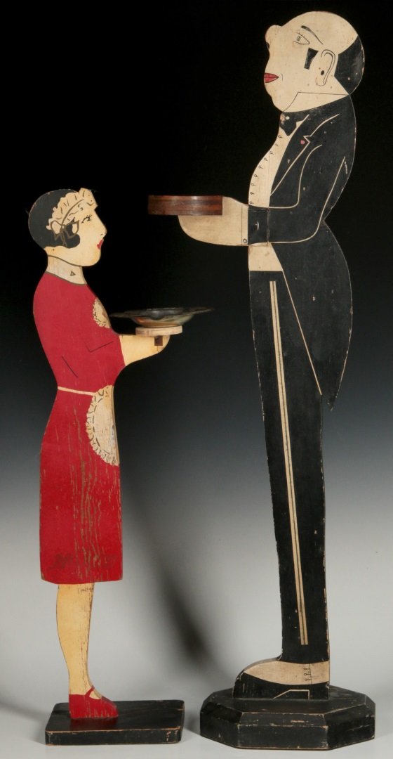 A RARE MOXIE COLA PAINTED WOOD MAID ASH TRAY STAND: A rare Moxie Cola promotional product similar to others often found without the Moxie connection. The Maid in red dress bears the 'Drink Moxie' logo debossed in the wood near the hem of her dress and