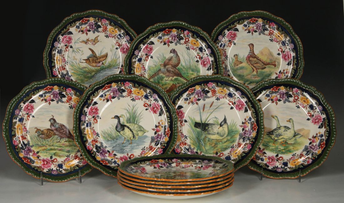 EARLY 20TH C. COPELAND SPODE TRANSFER GAME PLATES: A set of twelve transfer ware game plates, each with a different image of upland game bird in polychrome enamels and jewel tone rim borders. Each plate measures 10.25 inches diameter. We ship in-house