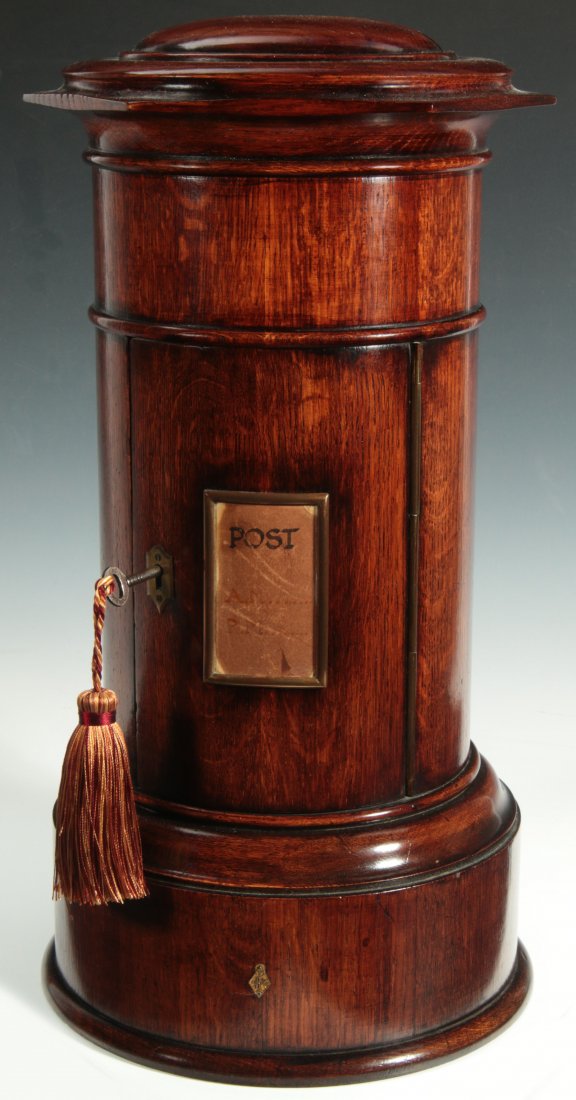 A GOOD 19TH C. LIGHTHOUSE FORM ENGLISH POST BOX: A handsome example with perfect dark mellow patina, excellent original finish, patinated brass escutcheon, sign frame and piano hinge, apparently the original key, the door opens to reveal the origina