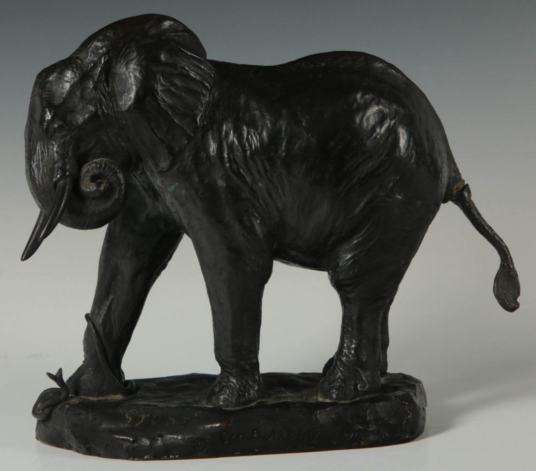 CARL AKELEY (1864-1926) BRONZE SCULPTURE TITLED 'STUNG': The bronze sculpture of an elephant encountering and dispatching a snake, signed Carl E. Akeley and dated 1914, inscribed title 'Stung' on the base. Further lettered with the founder's mark of Roman B