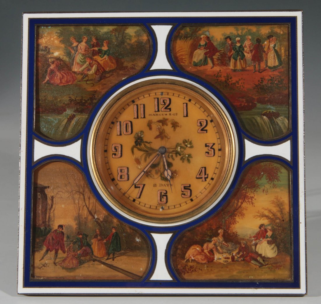 A MARCUS & CO EARLY 20TH C. FRENCH ENAMEL CLOCK: A square easel-back frame finished in blue and white enamel, four cut-out reserves backed by hand painted 18th and 19th century genre scenes. The dial highlighted with floral enamels, pink glow hands