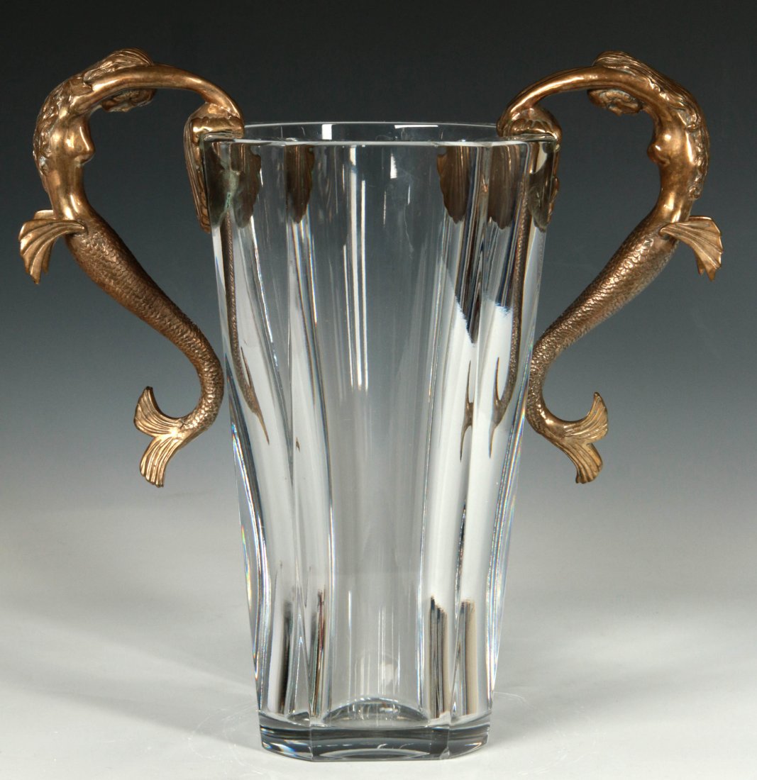 A BACCARAT VASE WITH BRONZE MERMAIDS SIGNED ERTE': A heavy cut and polished crystal vase signed Baccarat by acid stamp on the base; two bronze mermaid figural handles modeled by and signed Erte' as the pseudonym for Romain de Tirtoff the Russian born