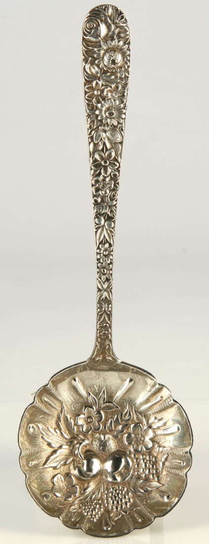 S. KIRK & SON 'REPOUSSE' PATTERN STERLING BERRY SPOON: Signed on the back and marked for sterling silver, measures 7.5 inches, weighs 2.20 ozt. We ship in-house for all items with the exception of very large and or very fragile pieces and some internation