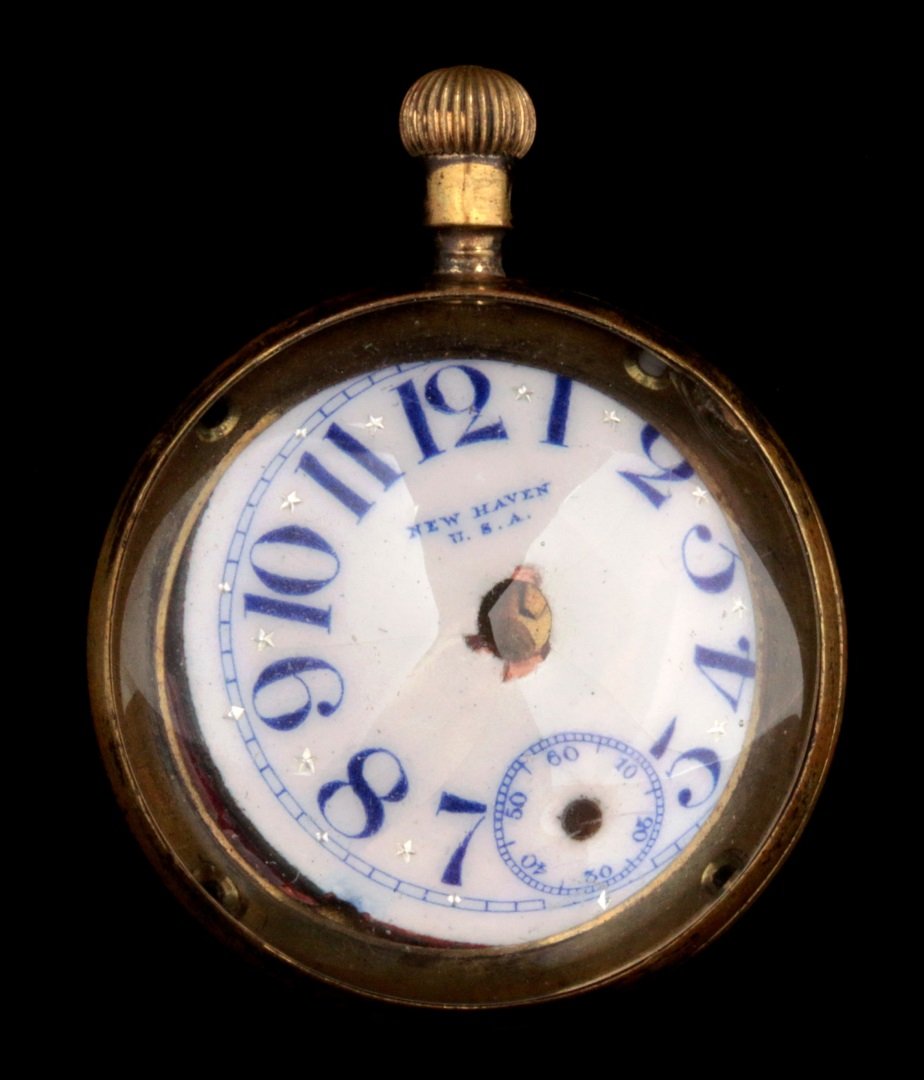 A NEW HAVEN BUBBLE GLASS DESK CLOCK: Measures 1.75 x 3.25 inches. AS FOUND - LOOSE AND MISSING PARTS. We ship in-house for all items with the exception of very large and or very fragile pieces and some international shipments.