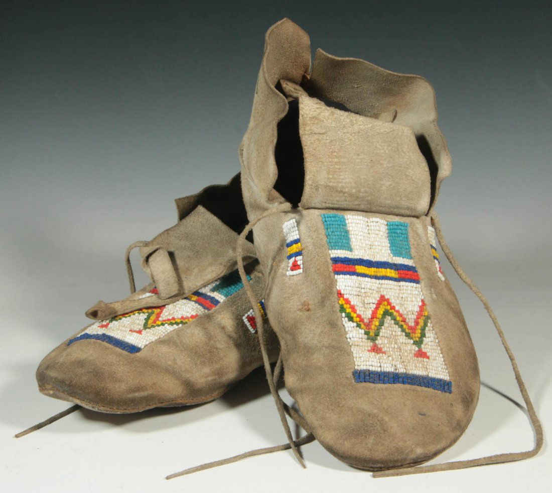 A PAIR SINEW SEWN CHEYENNE BEADED MOCCASINS (1 of 8)