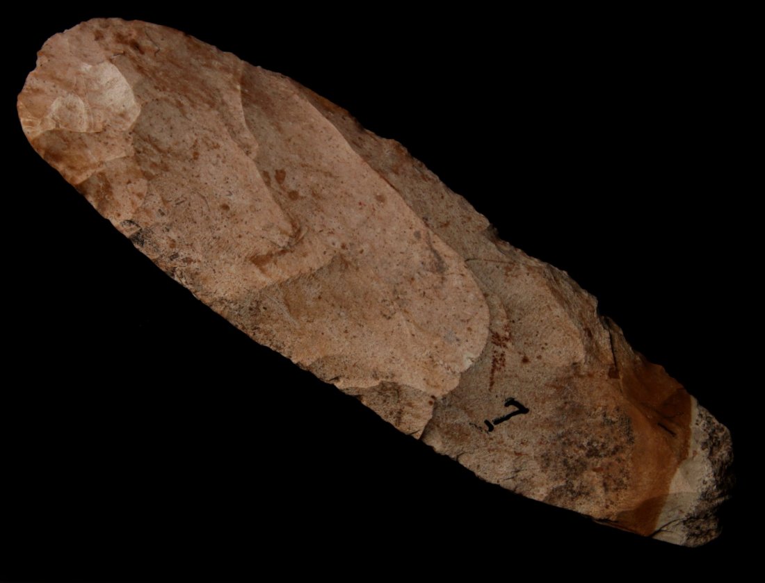 A 6.75-INCH NARROW SPADE OR HOE: Mississippian culture. Measures 6.75 x 2 inches. George Nichols collection. Nichols' notes regarding site 7 read as follows: "Located in field on upper terrace where Fox Hollow Branch joins Bonne Femm