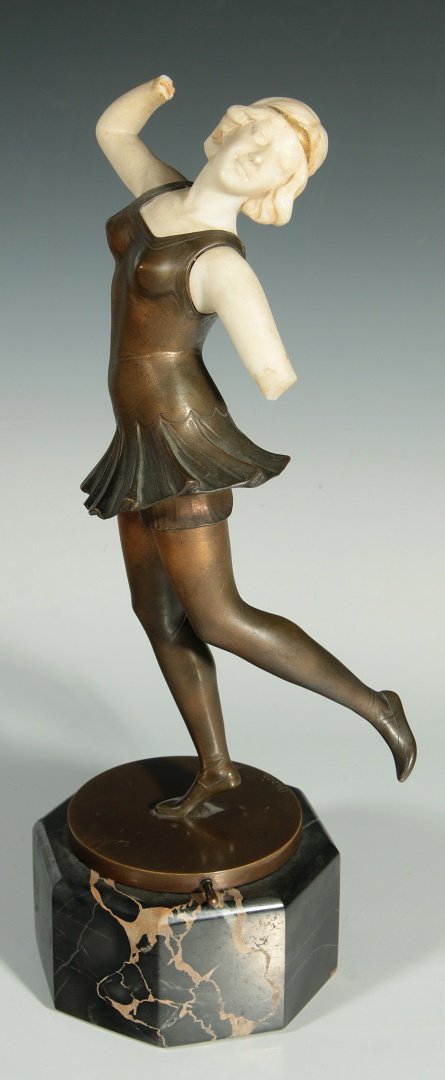 AN ART DECO BRONZE SIGNED BLANCZ, AS FOUND: An Art Deco bronze and alabaster dancer, signed BLANCZ on base and with Schumacher Foundry mark and Germany. The figure rotates on small peg in the marble plinth. Measures 14.5 inches tall in its curr