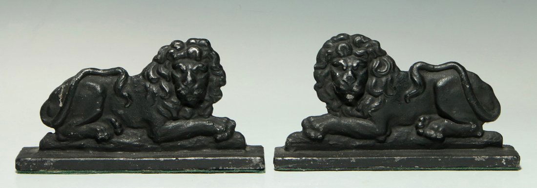 A PAIR CAST IRON BRITISH LION DECORATIVE ELEMENTS: Each measures 4.5 x 7.5 x 1.5 inches. We ship in-house for all items with the exception of very large and or very fragile pieces and some international shipments.