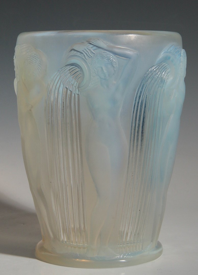 AN OPALESCENT 'DANAIDES' VASE SIGNED R. LALIQUE: Lalique, "Danaides" Vase, Catalogue Raisonne Felix Marcilhac, number 972, design date 1926, issued 1928-1947, an opalescent glass tapering cylindrical form with wide flaring mouth and supported on mol