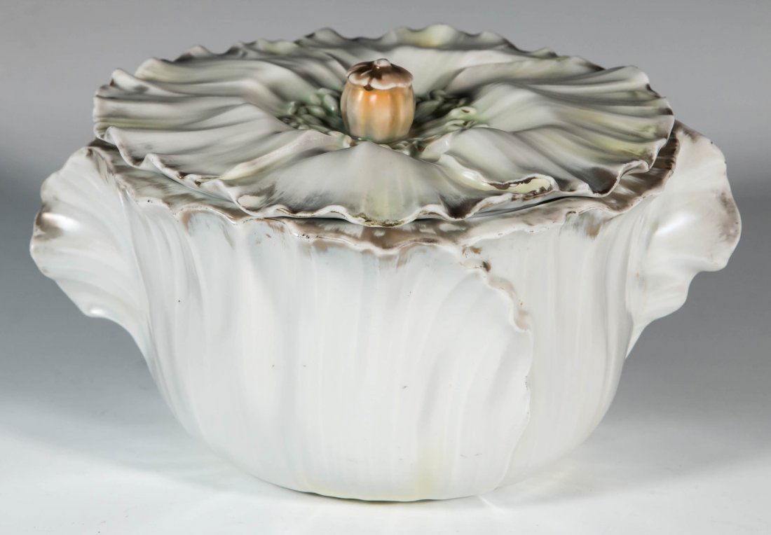 A ROYAL BAYREUTH WHITE SATIN POPPY CRACKER JAR: A scarce Royal Bayreuth Poppy mold cracker jar with cover, blue overglaze mark, circa 1900. Measures 4.25 x 8 inches. We ship in-house for all items with the exception of very large and or very fragil