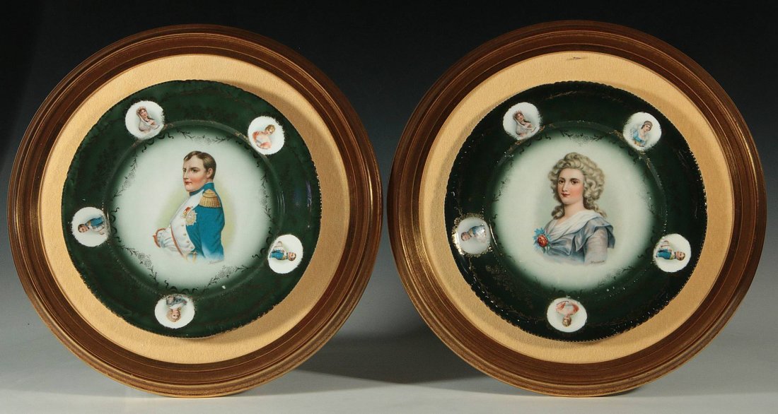 A PAIR OF CIRCA 1900 NAPOLEONIC CABINET PLATES: A pair of Bavarian painted plates one centering Napoleon and the other Hortense, dark green rim framed with five reserves and gilt highlights depicting Josephine, Madame Recamier, Napoleon, and Horten