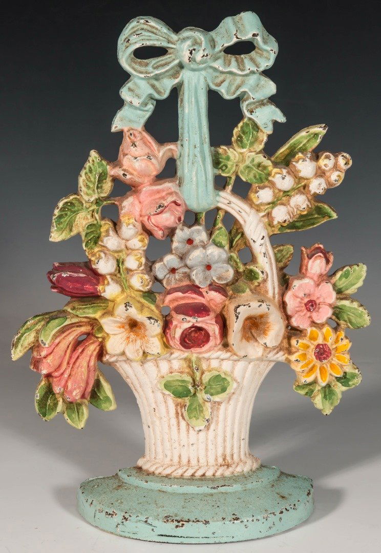 A HUBLEY CAST IRON FLOWER BASKET DOORSTOP (1 of 10)