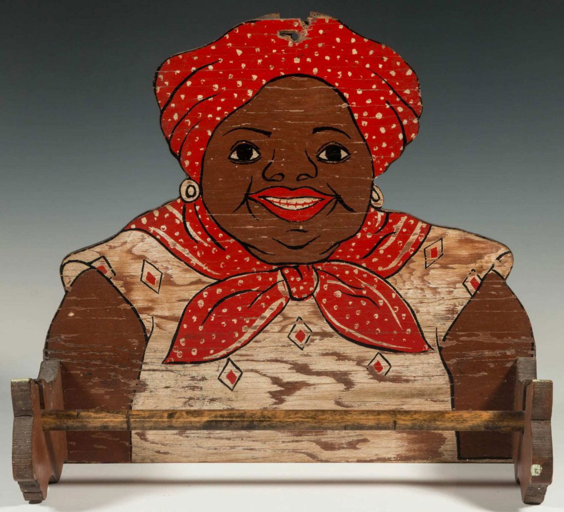 A VINTAGE MAMMY FIGURAL PAINTED WOOD TOWEL RACK: Circa 1930s and all original paint etc. Measures 1.25 x 12.5 inches. We ship in-house for all items with the exception of very large and or very fragile pieces and some international shipments.