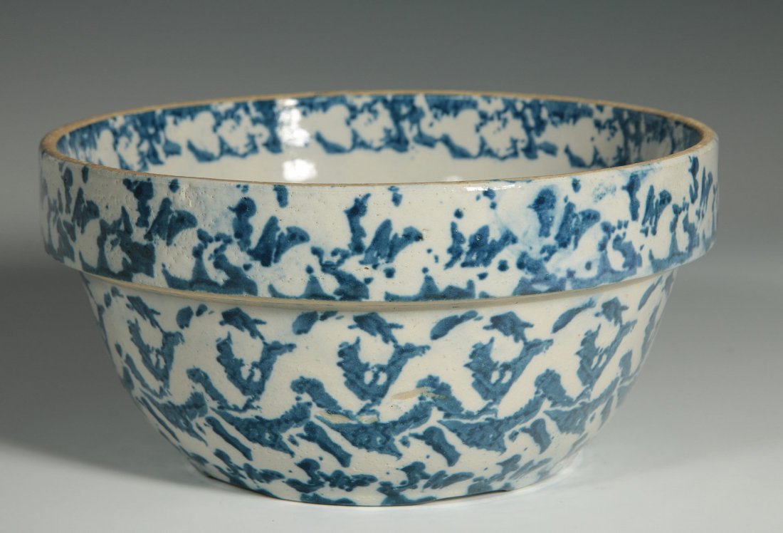 A BLUE AND WHITE SPONGE DECORATED STONEWARE BOWL (1 of 8)