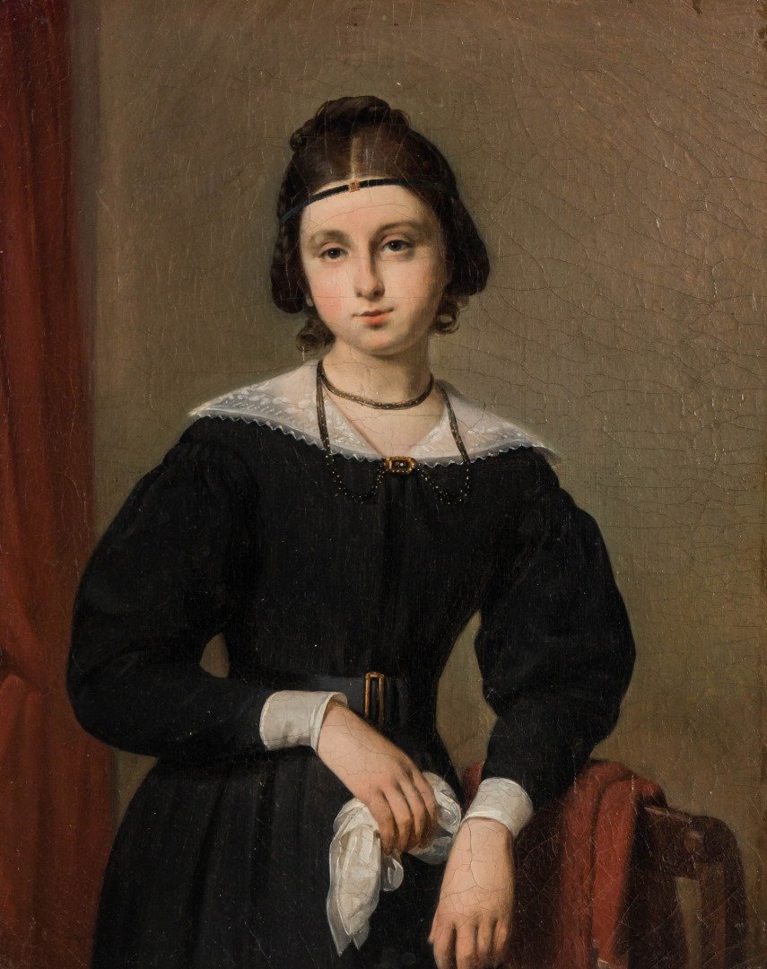 A 19TH CENTURY PORTRAIT OF A YOUNG WOMAN: Noted verso with a faded chipboard tag 'Emma Gammell age 14 years. Painted in Paris in 1840. Mrs. John Benjamin' and 'Property of Mrs. E.H. Lane, Concord, NH', unsigned, canvas measures 16 x 12.5 inch