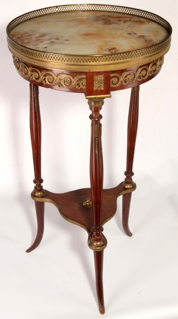 A LOUIS XVI STYLE ONYX AND GILT METAL GUERIDON (1 of 10)