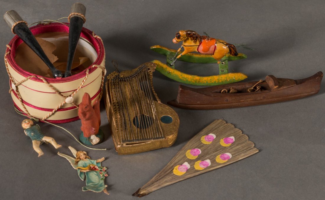 A LOT OF CANDY CONTAINERS, DRESDEN ORNAMENTS, MORE: The lot consists of: 1) An antique German candy container Drum with Drumsticks, measures 3 inches, the paper drum head is torn. 2) A Dresden candy container Zither made from gold embossed and pieced p