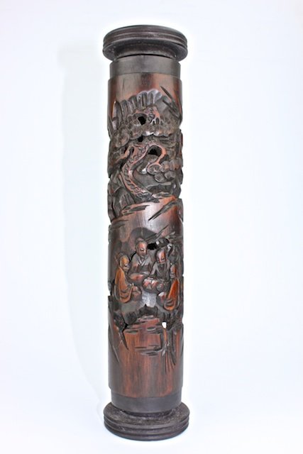 Chinese wood carved Incense Holder: A wooden carved incense holder depicting group of scholars playing chess and chatting in the garden 12" H x 2 ½ " D