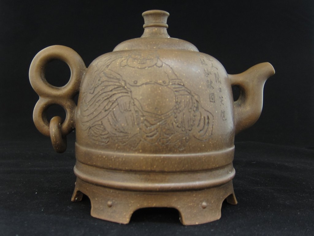 A Zisha Teapot with lid: A Zisha Teapot with lid ( made by Zhong Fang ) 6 3/4" x 4 1/2" x 5" Condition report - good