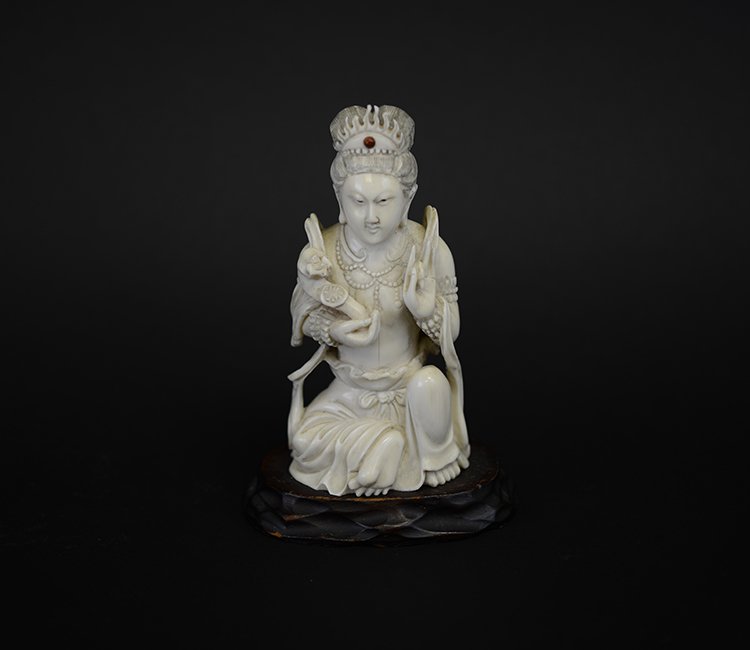 19th Century Chinese Seated Ivory Figure of Guanyin: 19th Century Chinese Seated Ivory Figure of Guanyin, with stone in her crown and scepter in her right hand; Provenance: From a New Hampshire Collection; appx. 5 H, with stand 5 1/2 H.