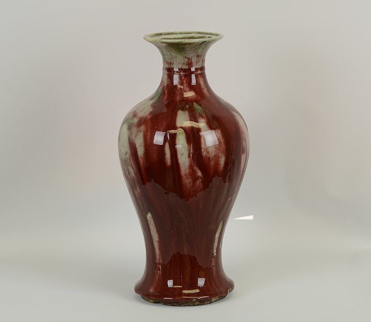 18th Century Chinese Ox Blood Porcelain Vase: 18th Century Chinese Ox Blood Glazed Vase, of baluster shape, the oxblood glazed body with white and green under glaze coloring; appx. 7 1/2 DIA, 15 1/4 H; Provenance: From a New Hampshire Collection.