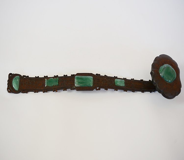 Late 18th Century Chinese Ruyi: Late 18th Century Wooden Ruyi, the handle inlaid with silver and green stone pendants; appx. 13 3/4 W, 3 3/4 D.