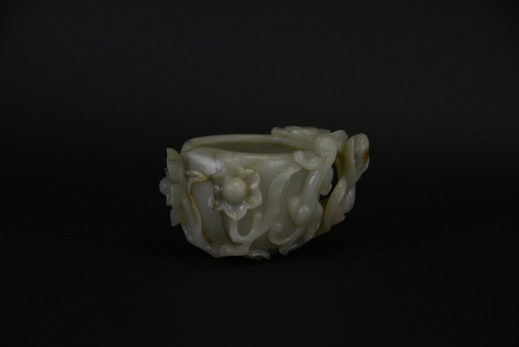 Chinese Jade Brush Washer: Chinese Jade Brush Washer, the large oval shaped brush washer with open carved flowering prunus around the body and a high relief carved chi dragon climbing up one side; appx. 5 in W, 2 5/8 in. H; Pro