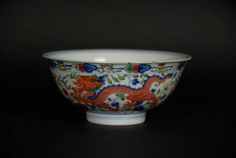 Chinese Wucai Dragon Bowl, Qianlong Mark & Period: Chinese Wucai 'Dragon & Phoenix' Porcelain Bowl, Qianlong Mark & Period, the bowl enameled to the interior with a central medallion containing a five clawed dragon, the exterior enameled with two five