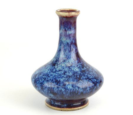 18th Century Chinese Flambé Glazed Bottle Vase: 18th Century Chinese Flambé Glazed Bottle Vase, the body of compressed form, with glaze of deep blue and purple tones, appx. 3 1/2 in. DIA, 4 1/2 in. H.