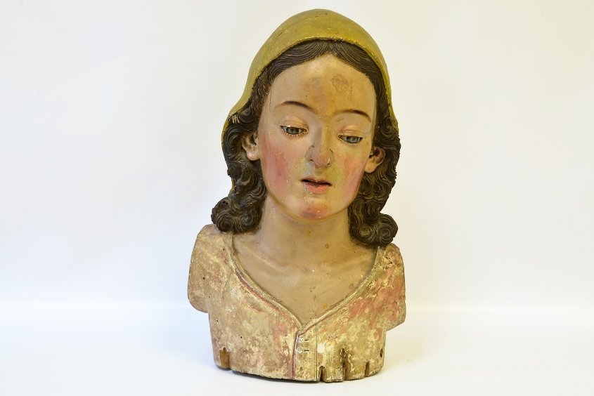 An 18th Century Spanish Polychrome Head: An 18th Century Spanish Polychrome Head, likely the Virgin Mary, the painted wood inset with glass eyes, with crack, surface wear, antique condition, appx. 13 5/8 in. H.