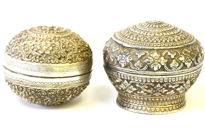 A Pair of Middle Eastern Silver RepoussÃ© Boxes: A Pair of Middle Eastern Silver RepoussÃ© Boxes, the largest appx. 2 1/2 in. H, 2 5/8 in. DIA.