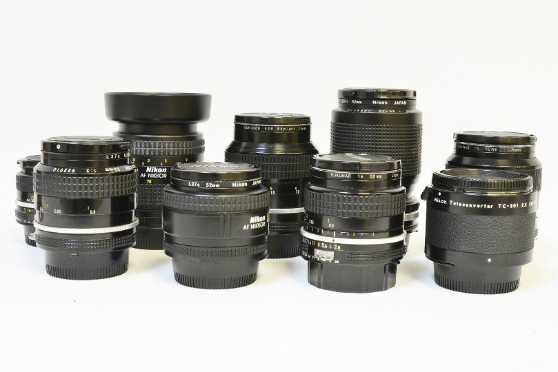 A Collection of Nikon Nikkor Lenses: A Collection of Nikon Nikkor Lenses, nine lenses total, including Nikon Nikkor 35 mm F1.2 AI lens, Nikon Nikkor AF 50 mm F/1.4 D lens with L37c Filter 250, a Nikon Nikkor 50 mm F1.8 AI lens #2119928,