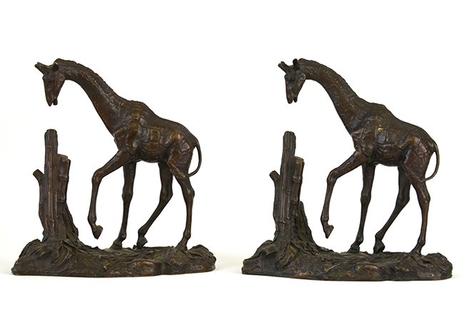 A Pair of Bronze African Giraffe Sculptures: A Pair of Bronze African Giraffe Sculptures, the sculptures of African Giraffes issued by the Franklin Mint marked "1976 Pollana", appx. 5 in. W.