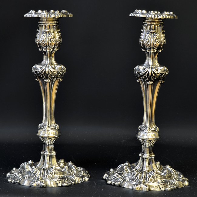 Pair of Early 19th C. English Silver Candlesticks: Pair of Early 19th C. English Silver Candlesticks, the hollow sterling silver candlesticks with rococo decoration by John Watson of Sheffield, with sterling and maker's marks, date mark to 1820, appx