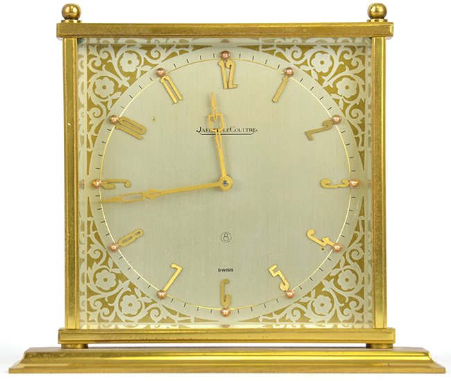 A Swiss Jaeger LeCoultre Brass Mantel Clock: A Swiss Jaeger LeCoultre Brass Mantel Clock, with surface scratches, appx. 4 1/2 in. H, 5 1/2 in. W.