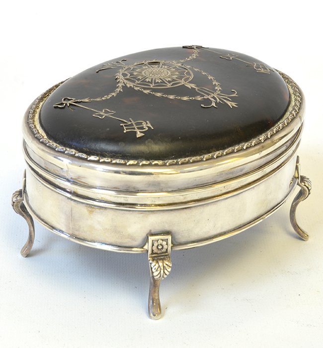 An English Silver and Tortoiseshell Box: An English Silver and Tortoiseshell Box, the tortoiseshell top with silver inlay, the top and base with London sterling marks, maker's marks for Charles & Richard Comyns, 1918/1919, appx. 6 in. W, 3 1