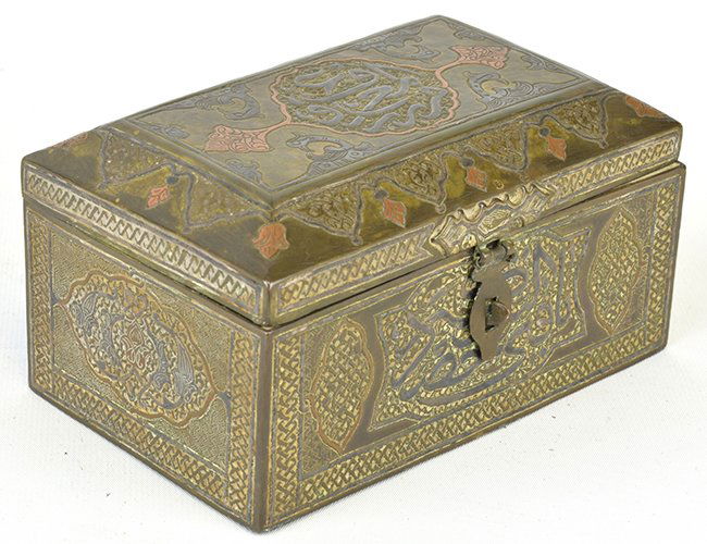 A Middle Eastern Mixed Metal Box: A Middle Eastern Mixed Metal Box, the copper and brass box with inscriptions, appx. 6 in. W, 3 3/4 in. D.